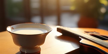 一杯豆浆弹吉他究竟是哪首歌？